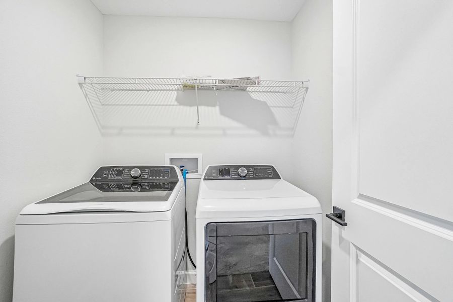 Laundry room features a washer and dryer Laundry room features a washer and dryer