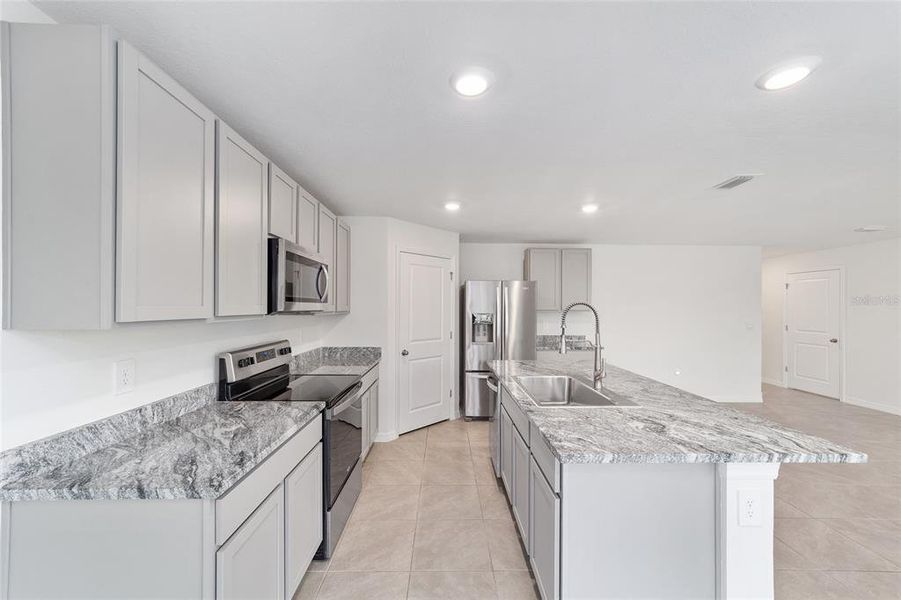 Furnished interior view inside a new home in Ocala Crossings South, Ocala (Image 5). Furnished interior view inside a new home in Ocala Crossings South, Ocala (Image 5).