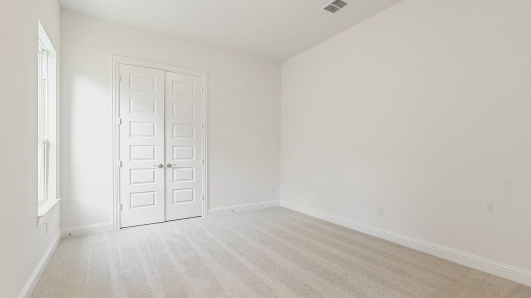 Representative furnished interior of a home built from the Vanderbilt by DRB Homes in Brookewater, Rosenberg (Image 15).