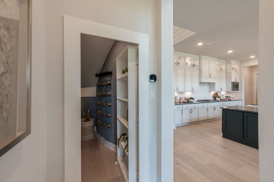 Representative furnished interior of a home built from the Woodbridge by Tri Pointe Homes in Bridgeland, Cypress (Image 19).