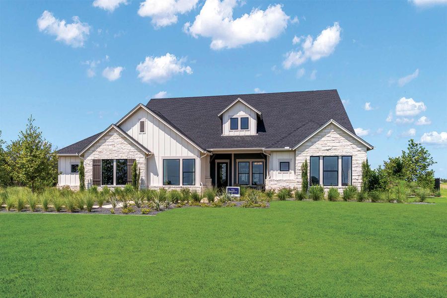 Representative exterior photo of a completed home built from the The Monterey by David Weekley Homes in Leander Estates, Leander, TX (Image 2).