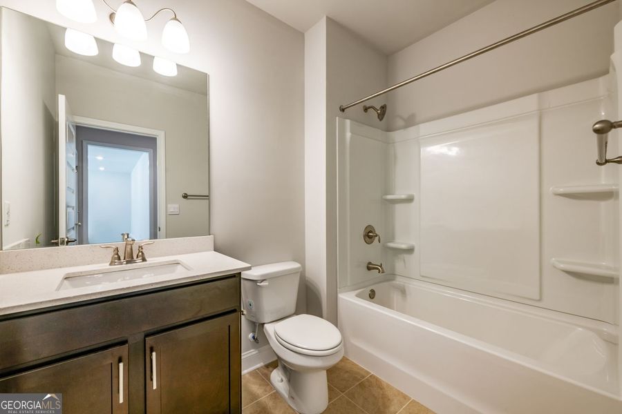 Furnished interior view inside a new home in Carson's Walk, Macon (Image 8).
