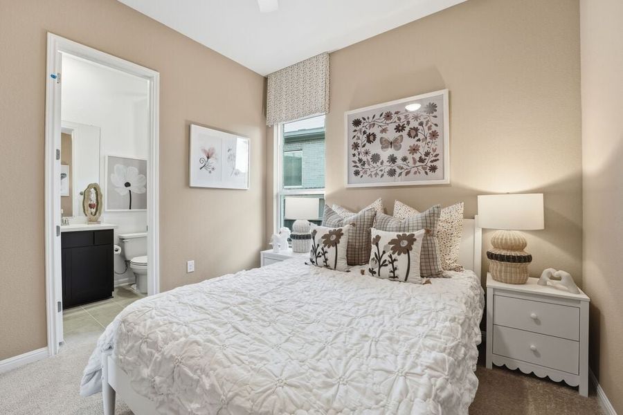 Representative furnished interior of a home built from the Burnet by Taylor Morrison in Village Grove, Dripping Springs (Image 14).