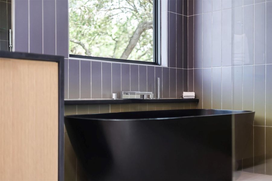 A floating tub positioned perfectly under the skylight for the ultimate evening wind-down