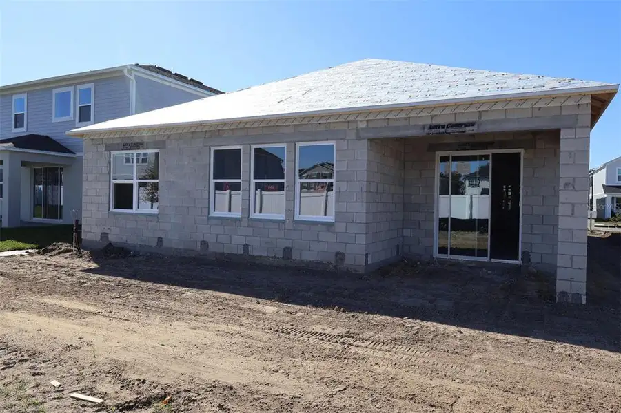 Exterior details and patio area of a home in Estates at Rivercrest, Sanford (Image 3).