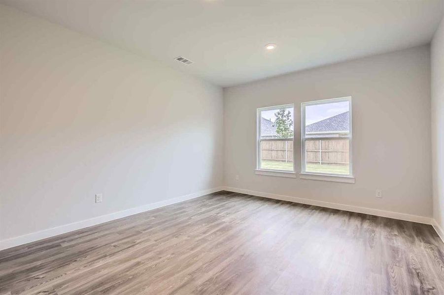 Spacious, unfurnished interior of a new home in Prestige Collection at Overland Grove, Forney (Image 21).
