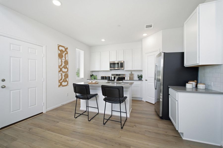 Furnished interior view inside a new home in Municipal Drive Townhomes, Leander (Image 12). Furnished interior view inside a new home in Municipal Drive Townhomes, Leander (Image 12).