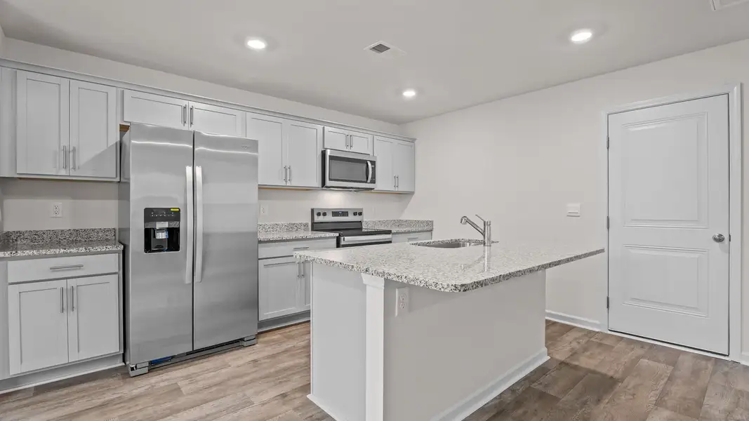Furnished interior view inside a new home in Hobbs Farm, Ayden (Image 4).