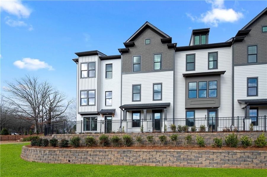 Front exterior of a new home in Barrett Pointe, Kennesaw, GA, highlighting curb appeal (Image 17).