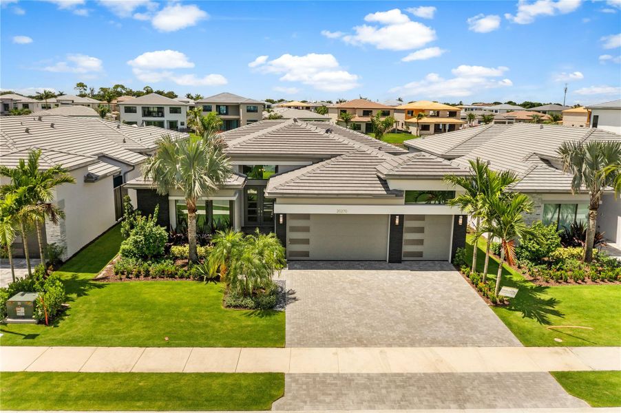 Front exterior of a new home in , Boca Raton, FL, highlighting curb appeal (Image 32). Front exterior of a new home in , Boca Raton, FL, highlighting curb appeal (Image 32).