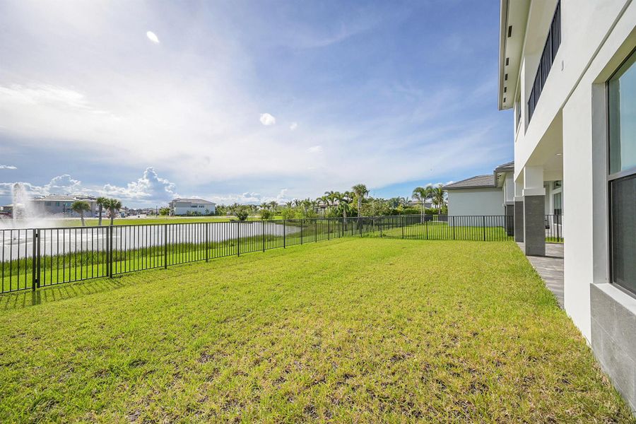 Front exterior of a new home in Apex at Avenir, Palm Beach Gardens, FL, highlighting curb appeal (Image 28).