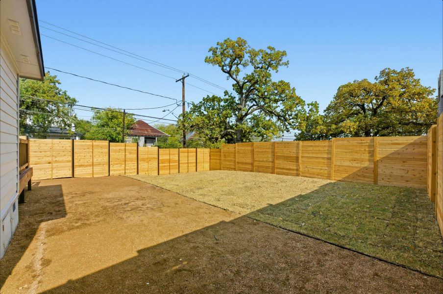 View of fenced backyard