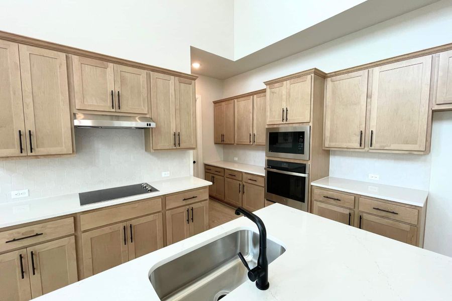 Furnished interior view inside a new home in Whisper Valley, Manor (Image 11).