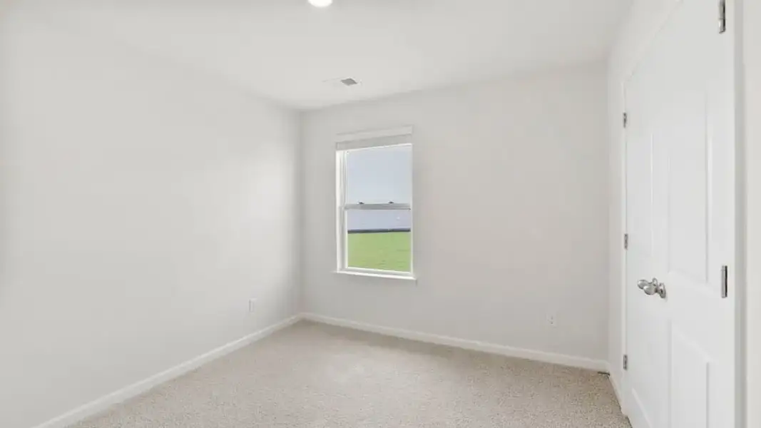 Spacious, unfurnished interior of a new home in Village Grove, Greenville (Image 21).