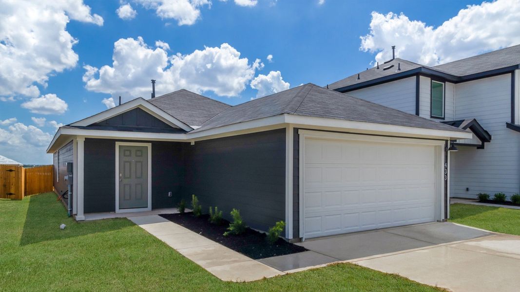 Representative exterior photo of a completed home built from the The Estero by D.R. Horton in Prairie Lakes, Buda, TX (Image 1). Representative exterior photo of a completed home built from the The Estero by D.R. Horton in Prairie Lakes, Buda, TX (Image 1).