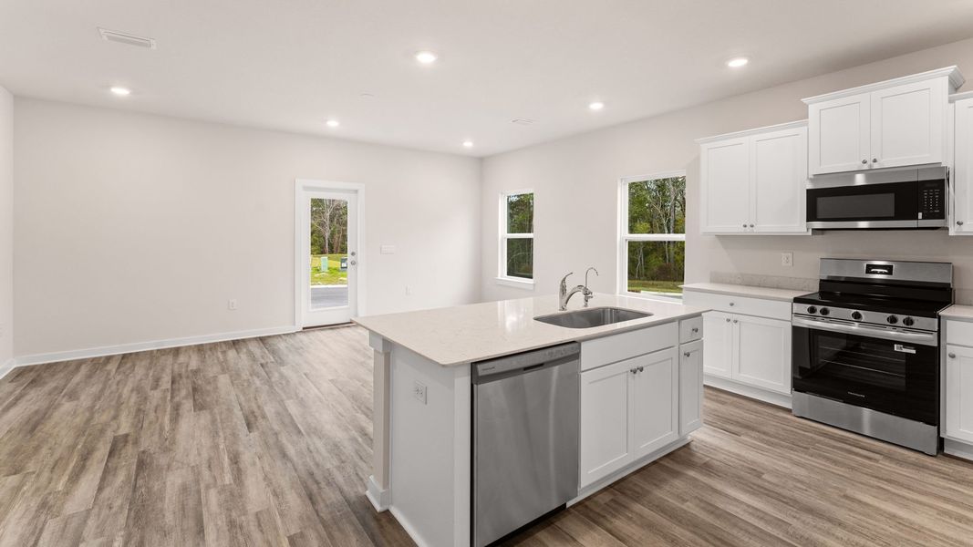 Representative furnished interior of a home built from the Palm Exterior by D.R. Horton in Genoa Landing Townhomes, Freeport (Image 4).