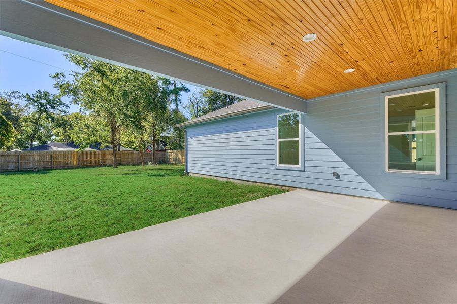 Wow! Enjoy your morning coffee or peaceful evenings under the cedar-lined covered back patio built for year-round living. Wow! Enjoy your morning coffee or peaceful evenings under the cedar-lined covered back patio built for year-round living.