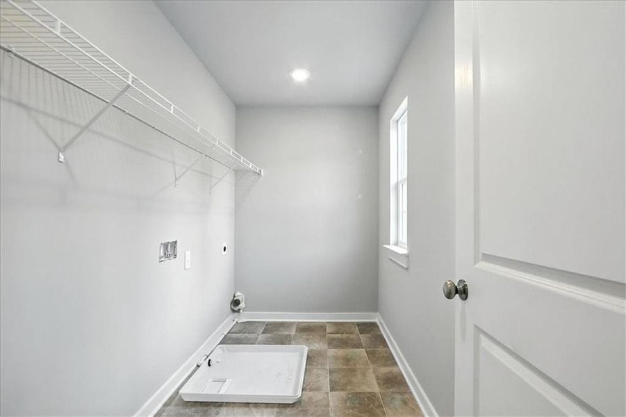 Spacious, unfurnished interior of a new home in Traditions of Braselton, Jefferson (Image 35).