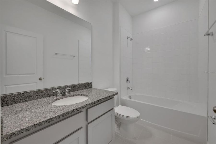 Furnished interior view inside a new home in Seaport Village, Tavares (Image 9).