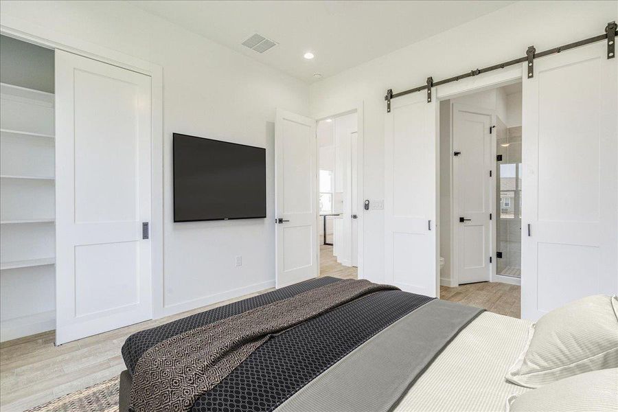 Primary bedroom on main floor with two closets Primary bedroom on main floor with two closets