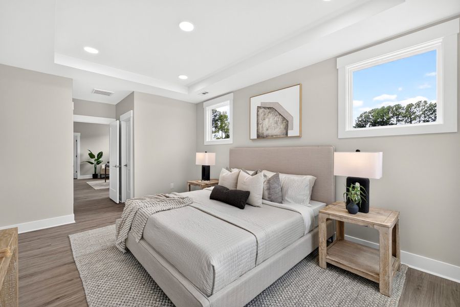 Representative furnished interior of a home built from the Weston End Unit by Baker Residential in Parc at Bradley Farm, Apex (Image 20).