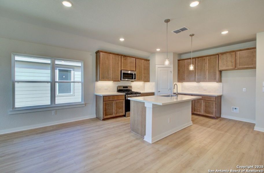 Furnished interior view inside a new home in Westridge - Premier, San Antonio (Image 5). Furnished interior view inside a new home in Westridge - Premier, San Antonio (Image 5).