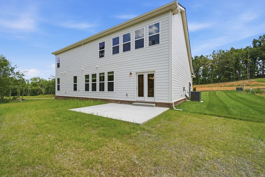 Exterior details and patio area of a home in Aden Woods, Fairview (Image 3).