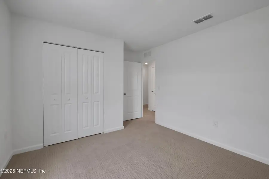 Spacious, unfurnished interior of a new home in Cordova Palms, St. Augustine (Image 12).