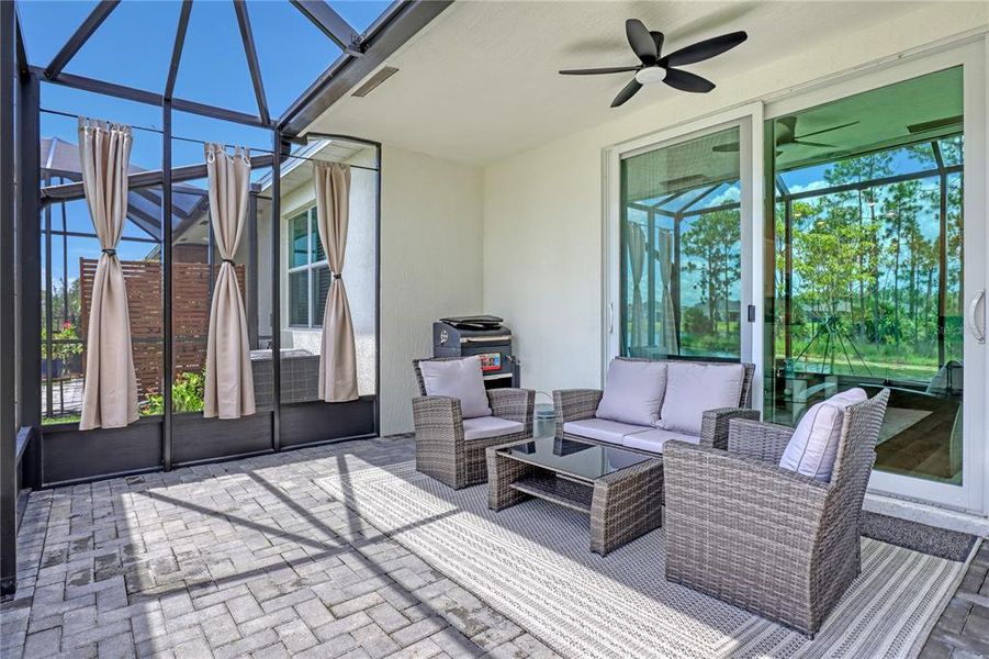 Exterior details and patio area of a home in The Timbers at Everlands, Palm Bay (Image 29).