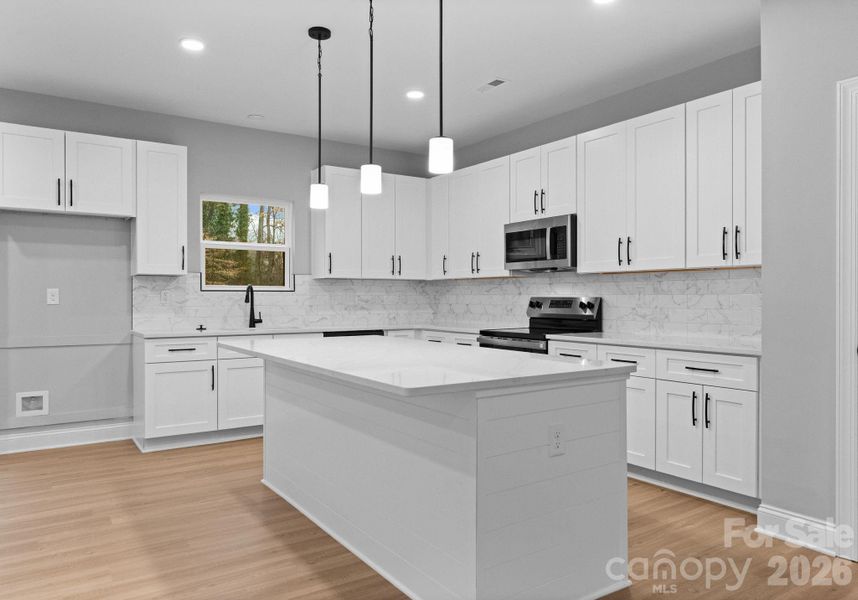 Furnished interior view inside a new home in , Charlotte (Image 9).