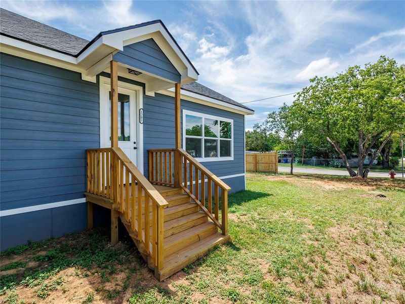 Exterior details and patio area of a home in , Brownwood (Image 3).