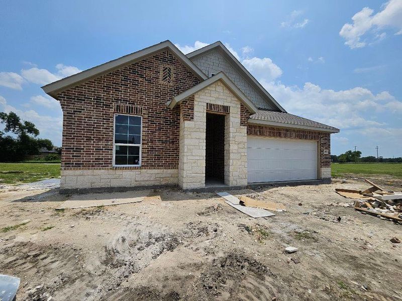 In-progress construction of a new home in The Hollow, Ennis, TX (Image 5).