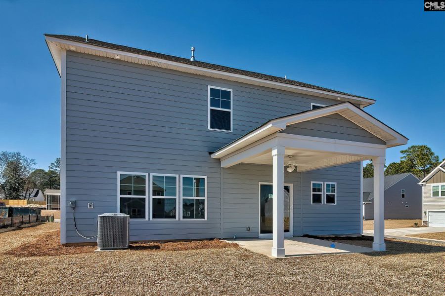 Front exterior of a new home in Cottages at Roofs Pond, West Columbia, SC, highlighting curb appeal (Image 21).