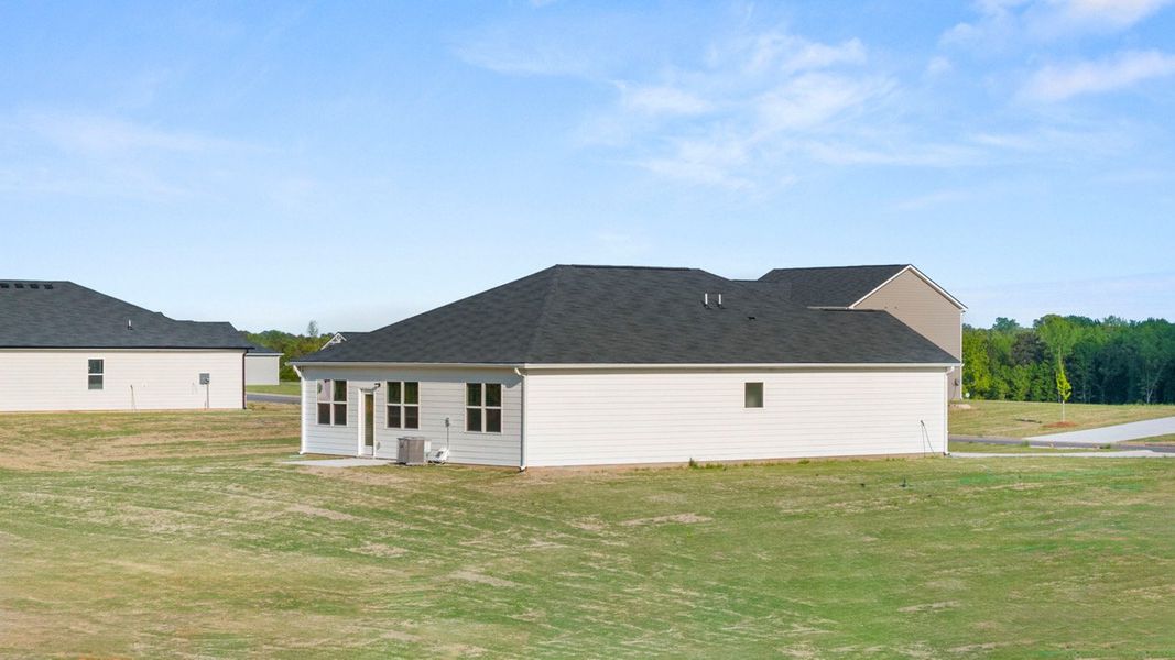 Exterior details and patio area of a home in Fox Crossing, Griffin (Image 2). Exterior details and patio area of a home in Fox Crossing, Griffin (Image 2).