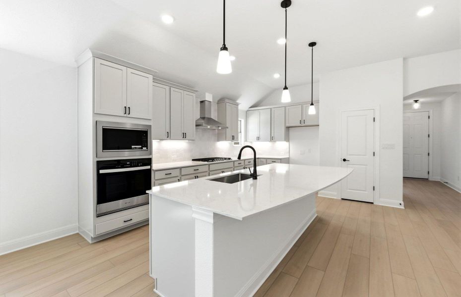 Furnished interior view inside a new home in West Cypress Hills, Spicewood (Image 13).