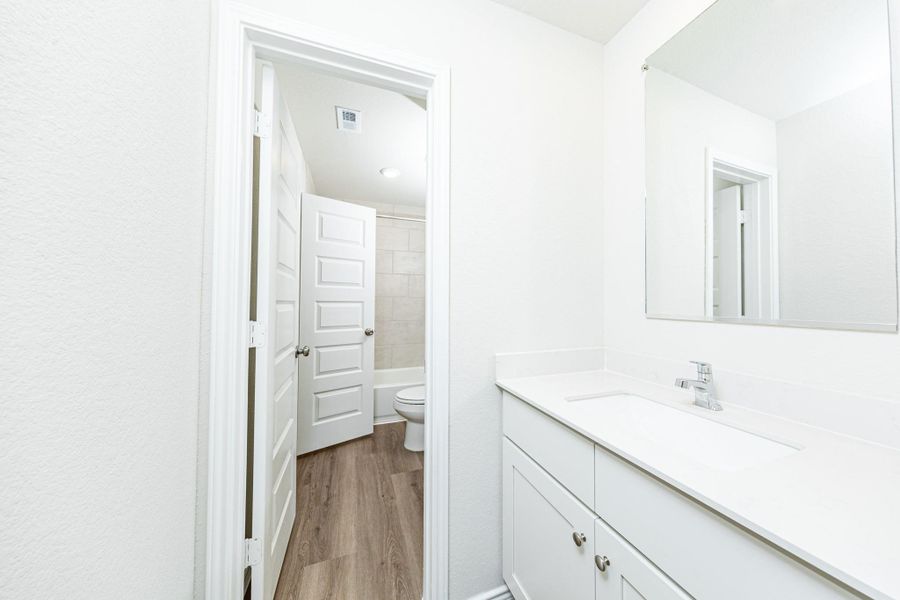 Furnished interior view inside a new home in Townsend Reserve, Splendora (Image 6).