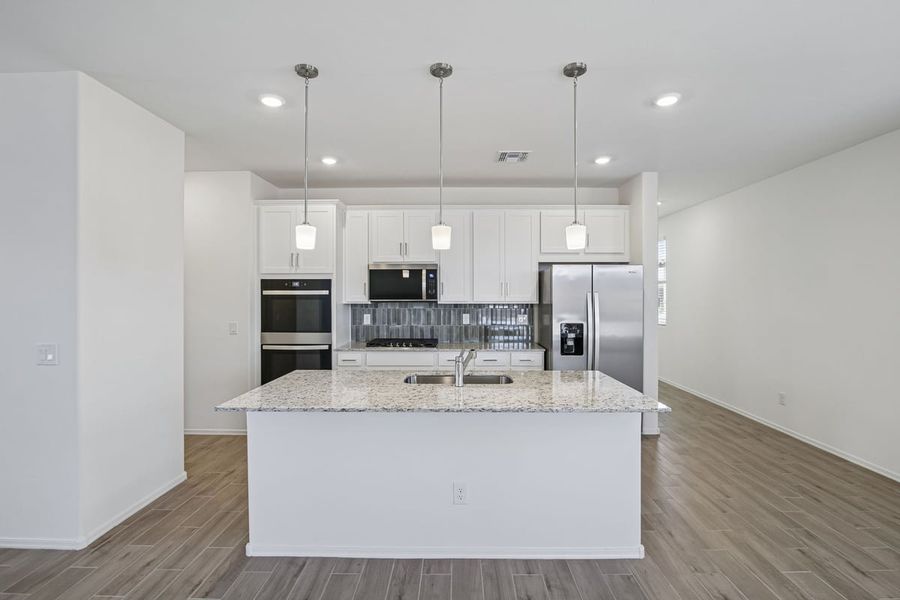 Furnished interior view inside a new home in Mandarina Reserve, Marana (Image 9).