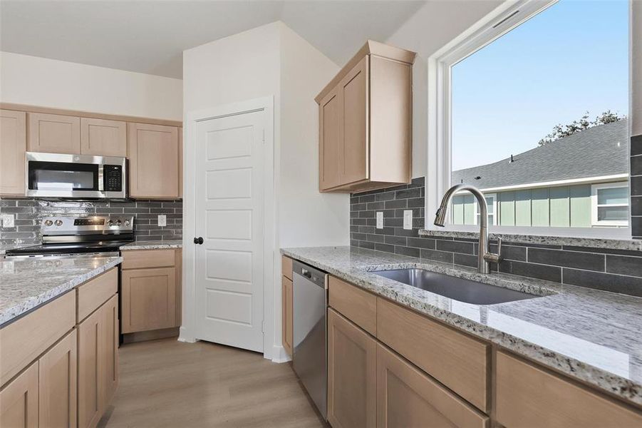 Furnished interior view inside a new home in , Tolar (Image 16).