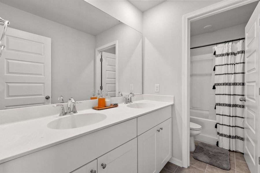 Furnished interior view inside a new home in Sweetgrass at Summers Corner, Summerville (Image 17).