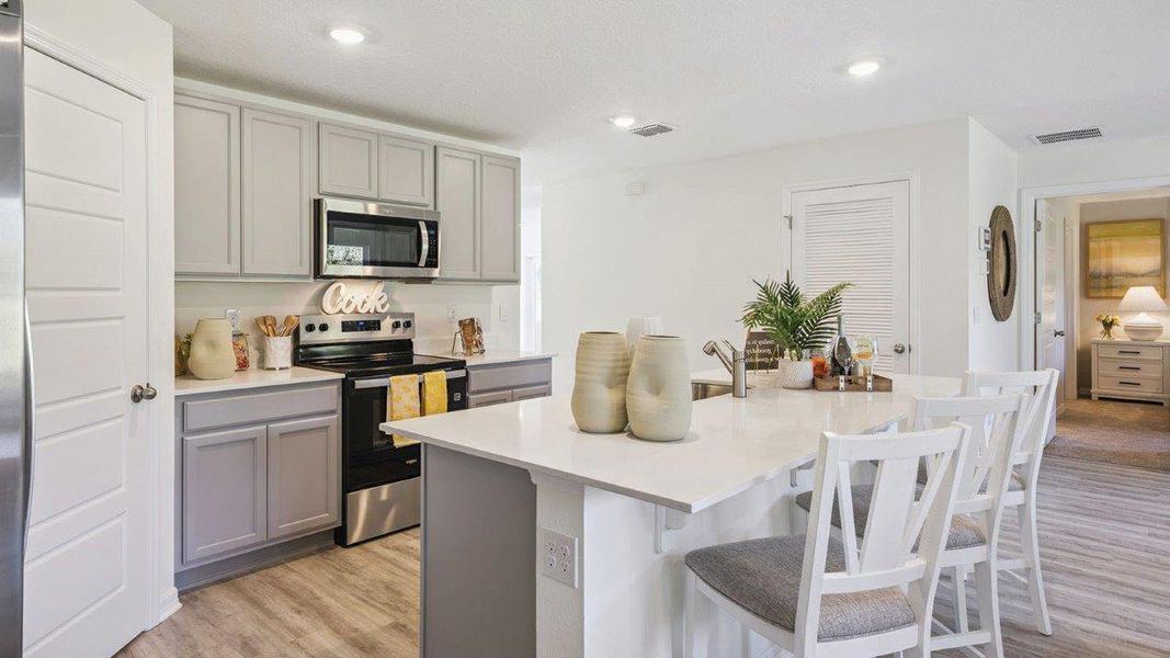 Furnished interior view inside a new home in Magnolia Pointe, Umatilla (Image 10).