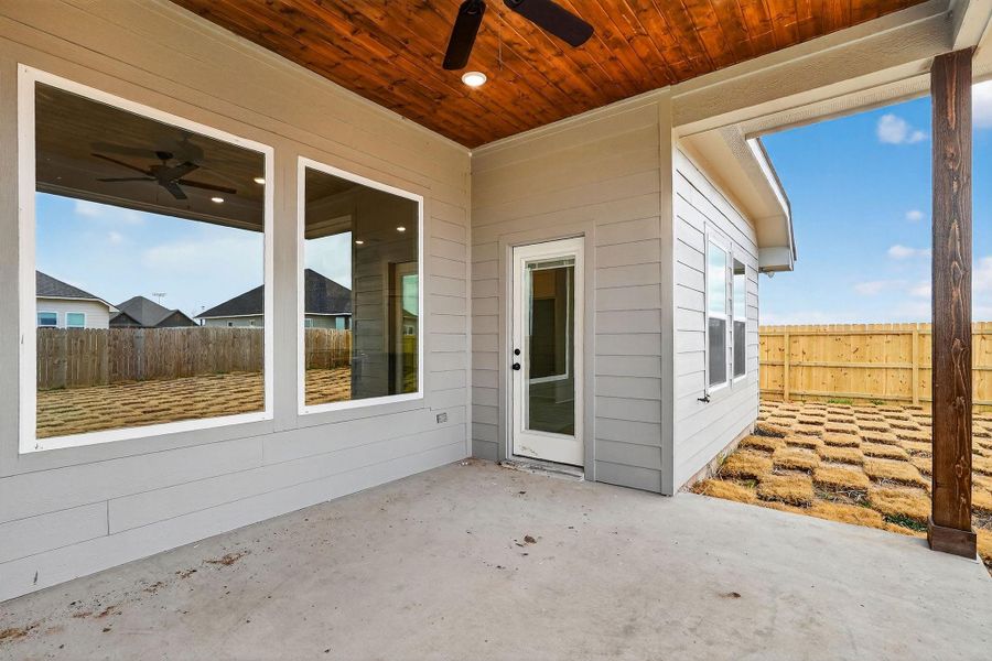 Exterior details and patio area of a home in , Snook (Image 4).