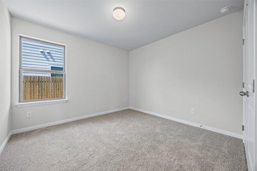 Plush wall-to-wall carpeting and clean neutral walls define this versatile secondary space. Plush wall-to-wall carpeting and clean neutral walls define this versatile secondary space.