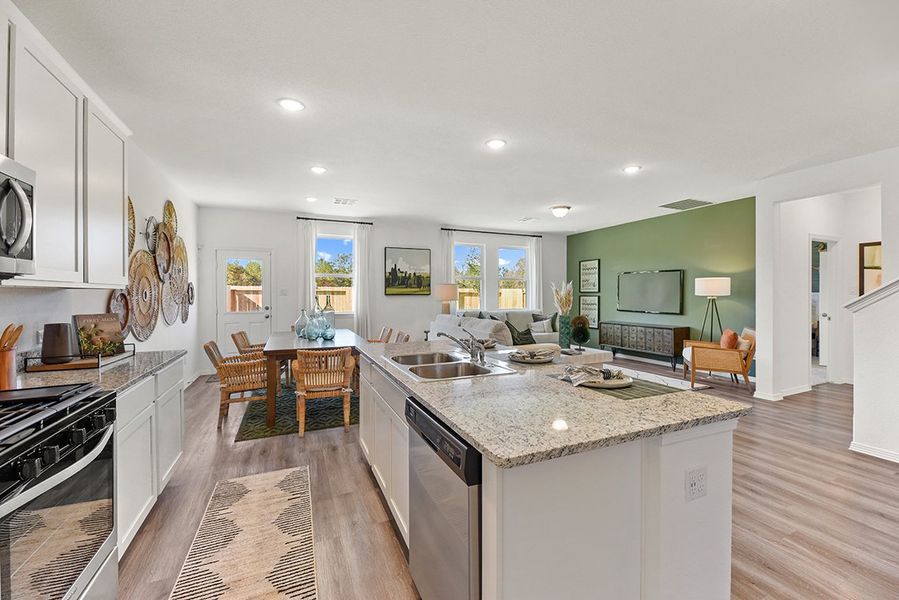 A kitchen with a large island. A kitchen with a large island.