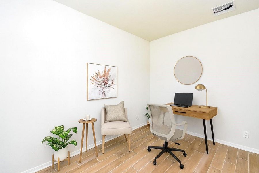 Convenient office/study located at the entrance of the home. (Virtually staged by A.I.) Convenient office/study located at the entrance of the home. (Virtually staged by A.I.)