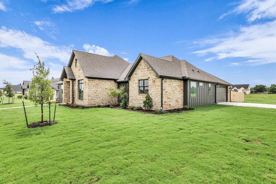 Front exterior of a new home in , Robinson, TX, highlighting curb appeal (Image 2). Front exterior of a new home in , Robinson, TX, highlighting curb appeal (Image 2).