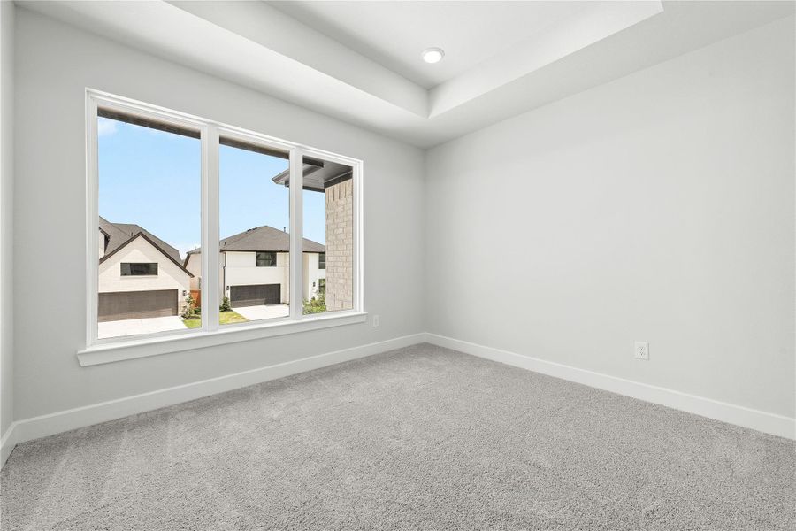 Spacious, unfurnished interior of a new home in Sunterra, Katy (Image 21).