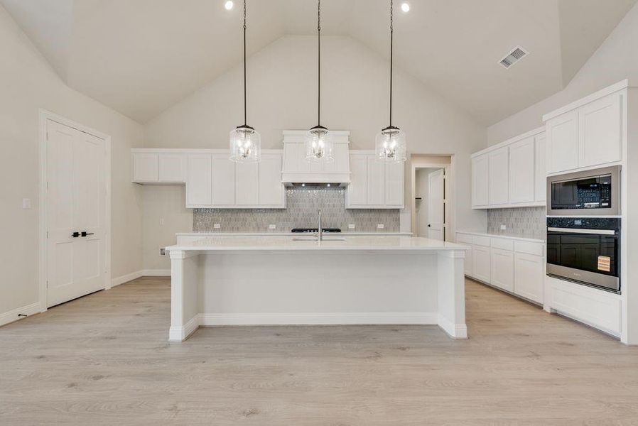 Furnished interior view inside a new home in Monterra, Fate (Image 5).