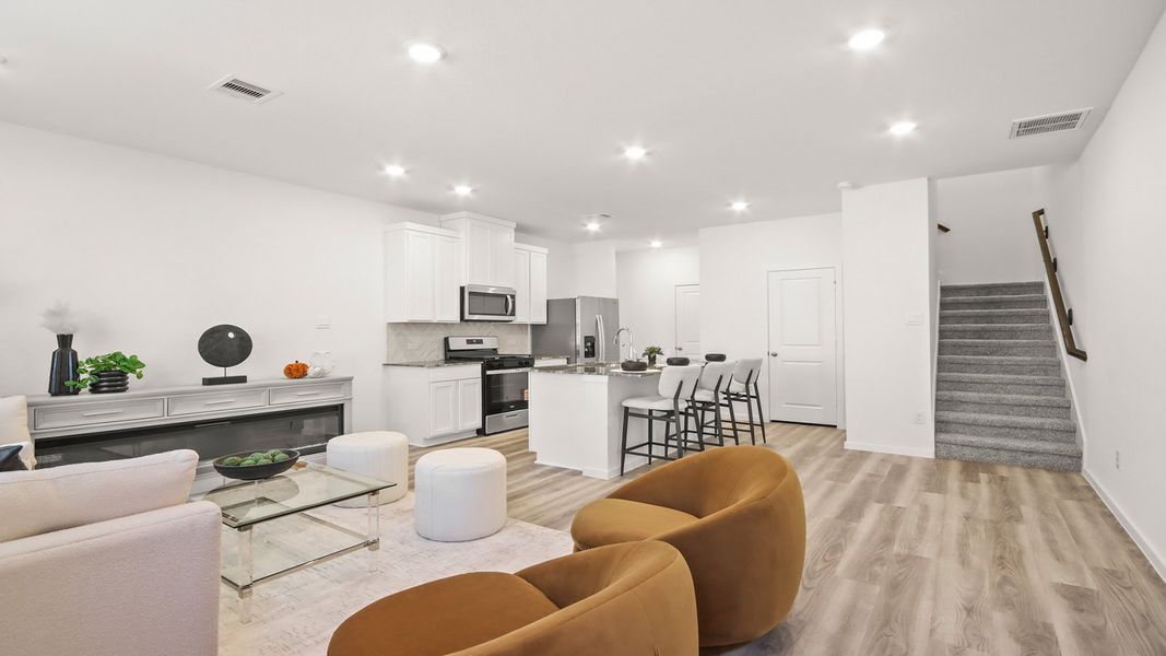 Representative furnished interior of a home built from the 1293 by D.R. Horton in Bridges on Lake Houston Villas, Humble (Image 5).