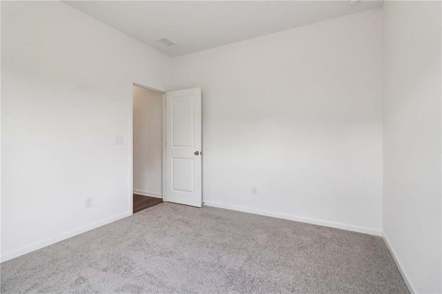 Spacious, unfurnished interior of a new home in Eastlyn Crossing, Flowery Branch (Image 16). Spacious, unfurnished interior of a new home in Eastlyn Crossing, Flowery Branch (Image 16).
