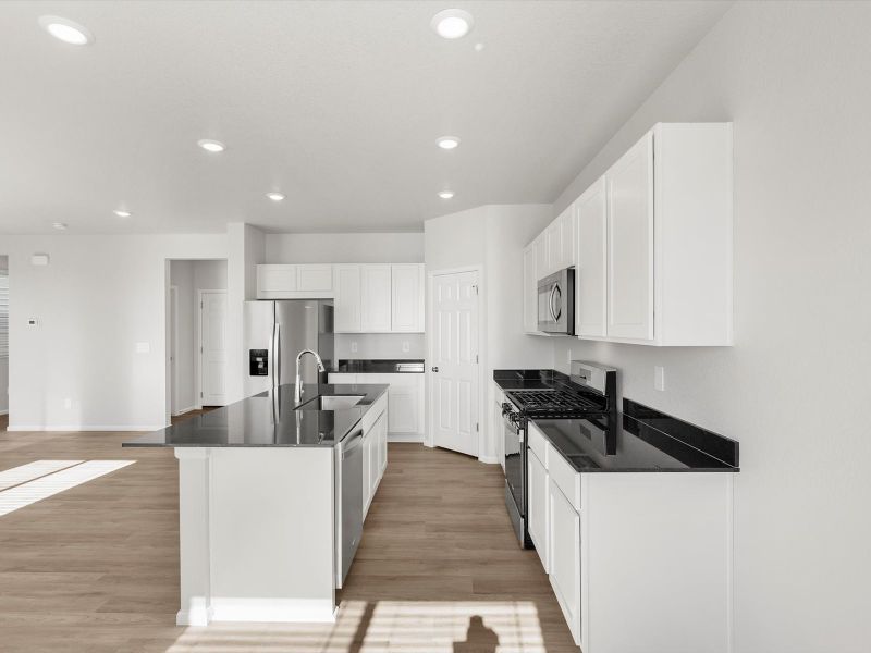 Furnished interior view inside a new home in Lorson Ranch: The Trail Collection, Colorado Springs (Image 3).